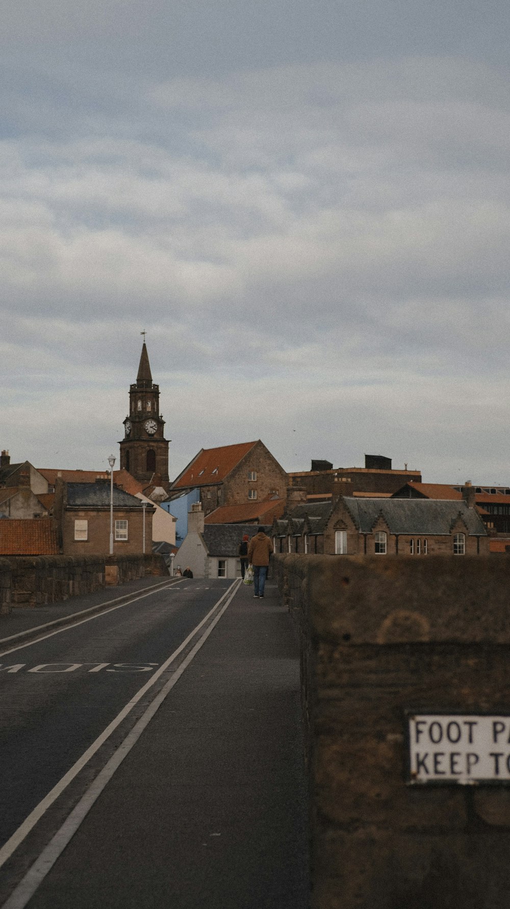 a person standing on a road