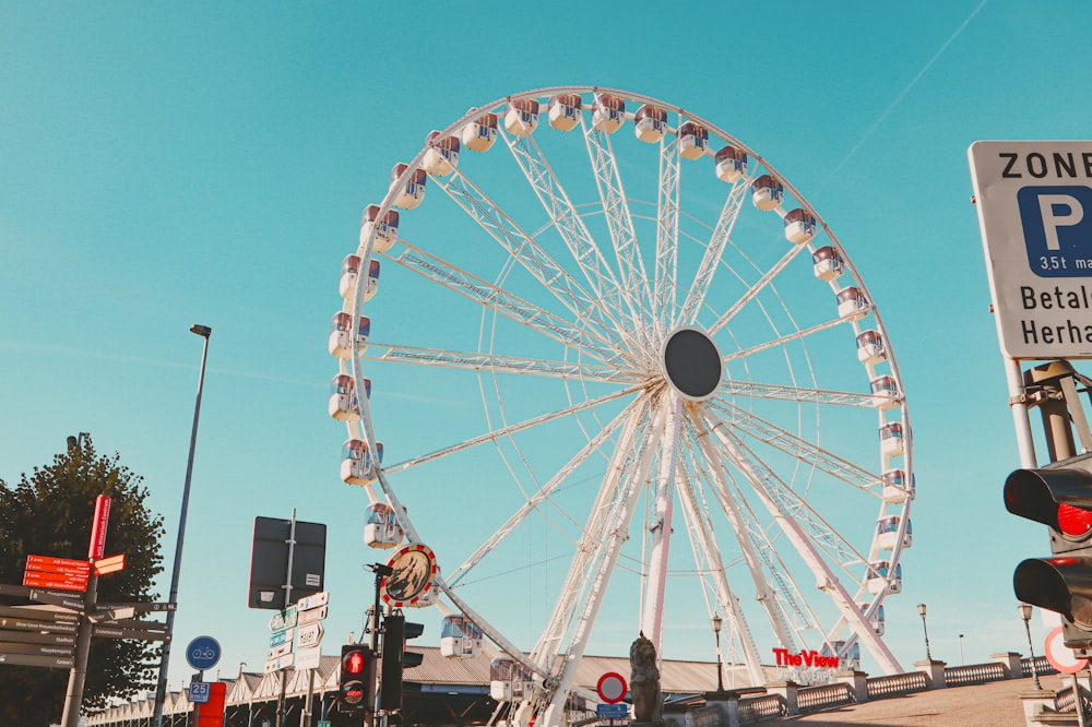 a ferris wheel with a blue sky