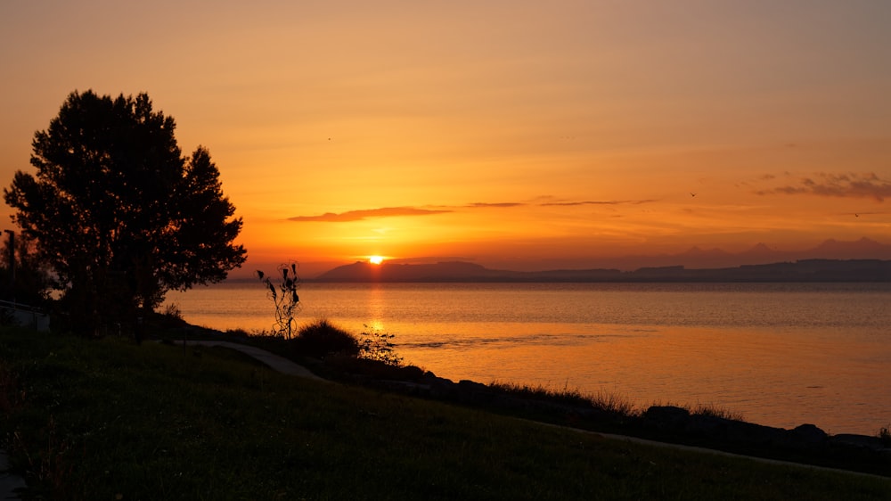 a sunset over a lake