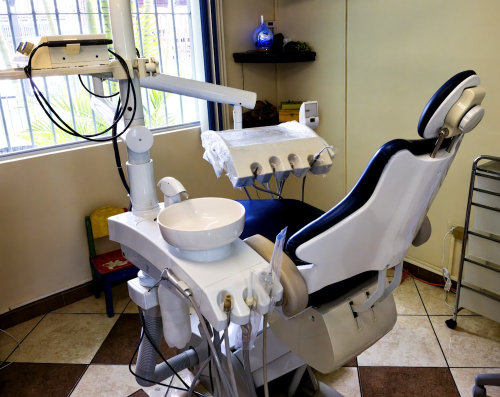 a dental chair in a room