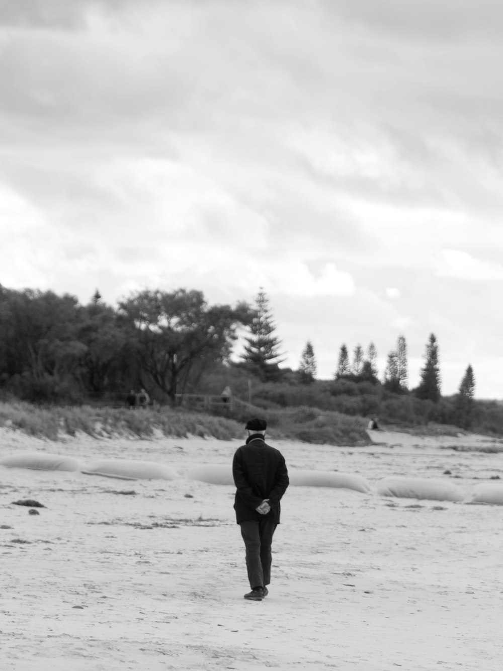 a man standing in a snowy field