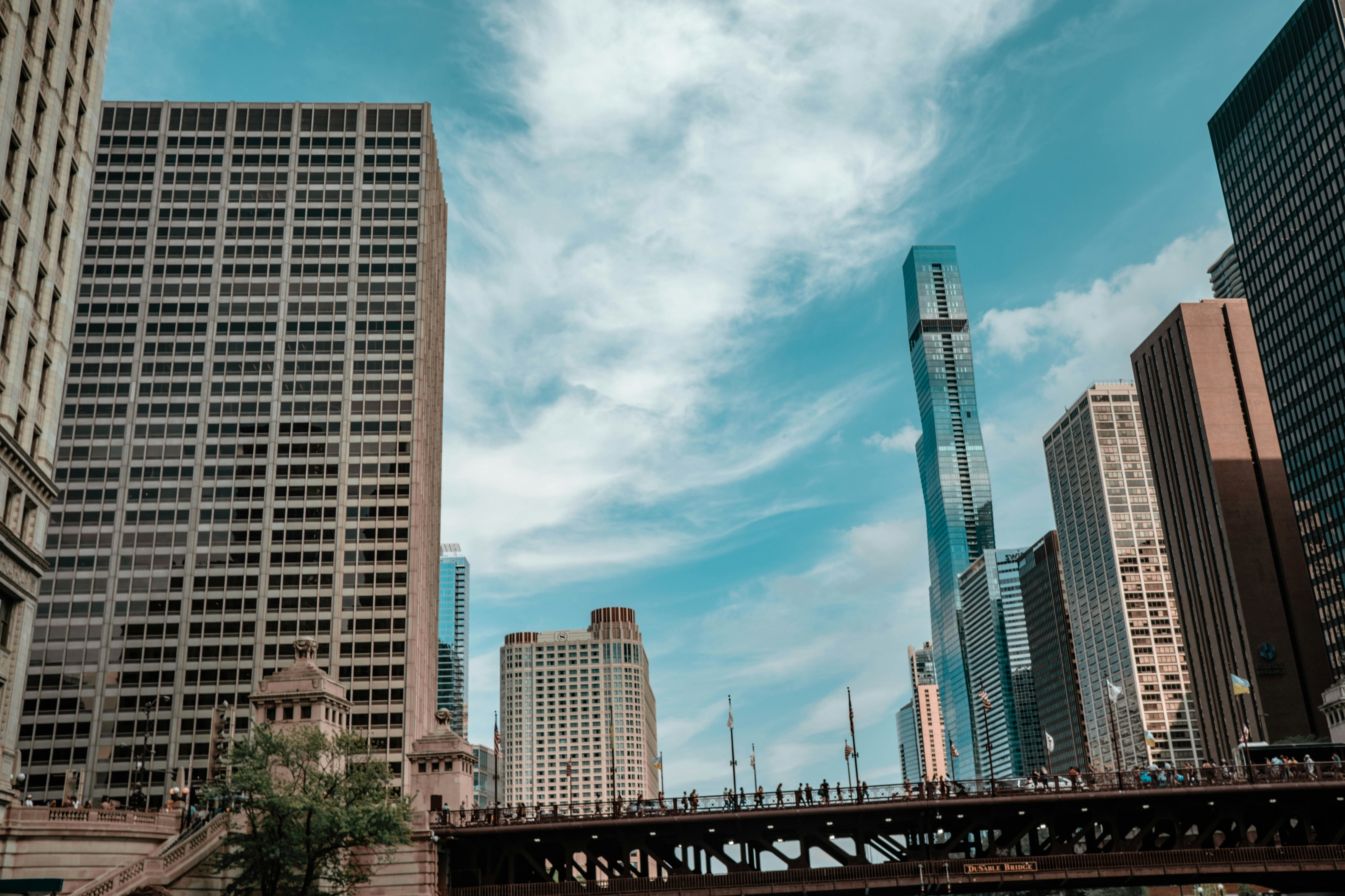 a city skyline with tall buildings