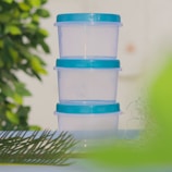 a plastic bottle with a blue cap