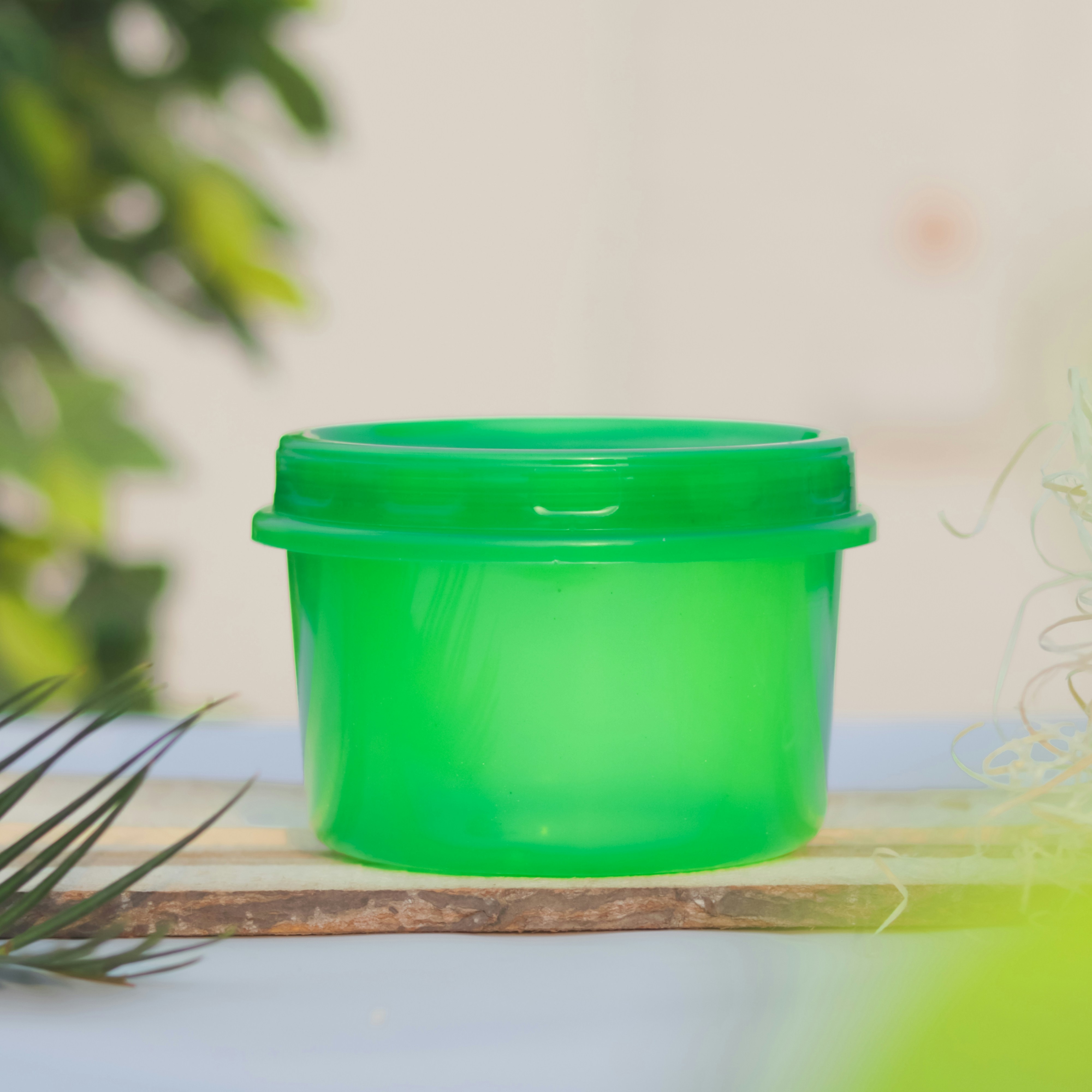 a green glass cup