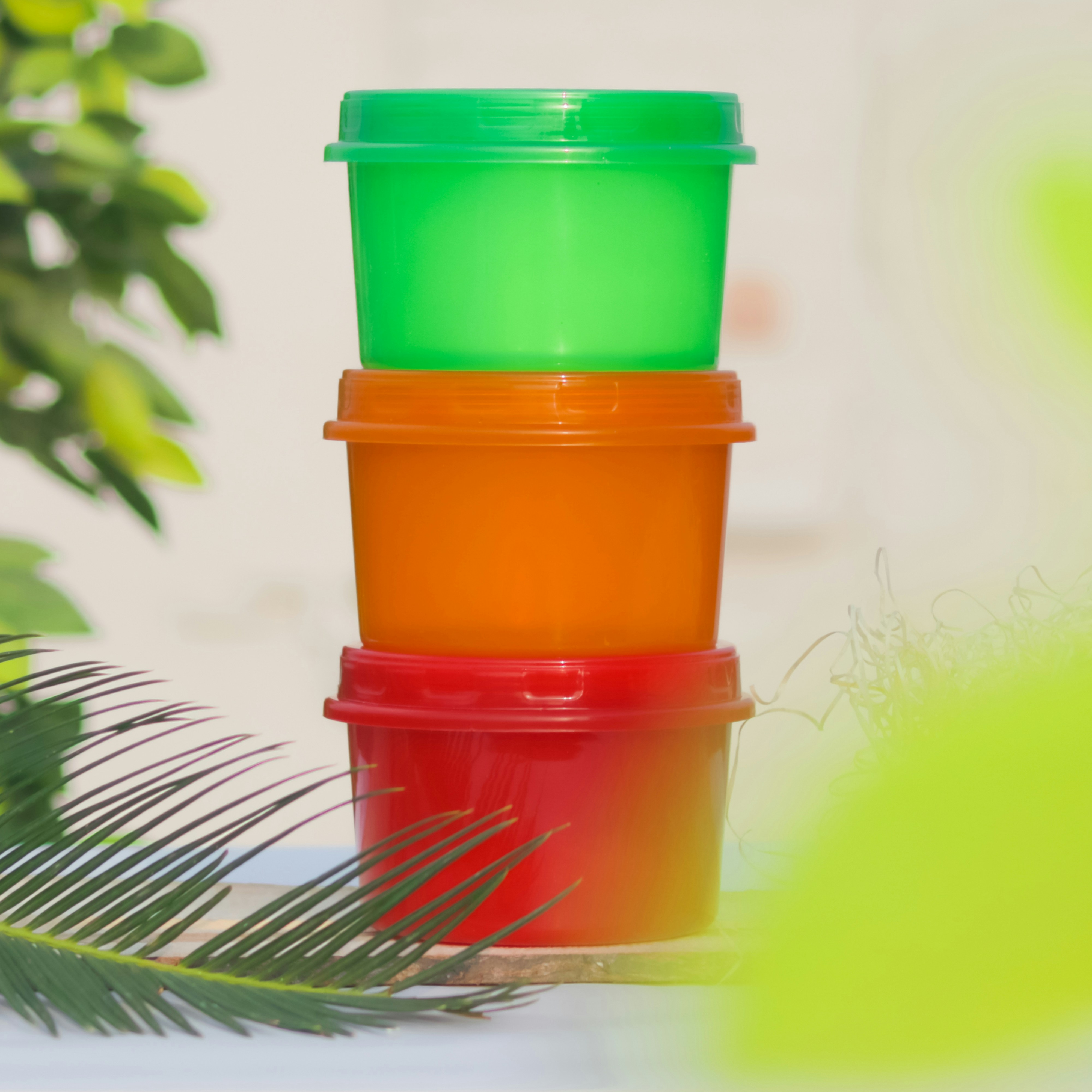 Close up of colorful plastic kitchen items containers and organizers, product detail shot