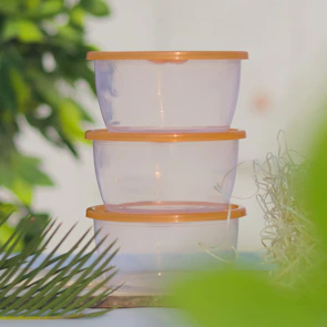 a glass jar with a liquid in it