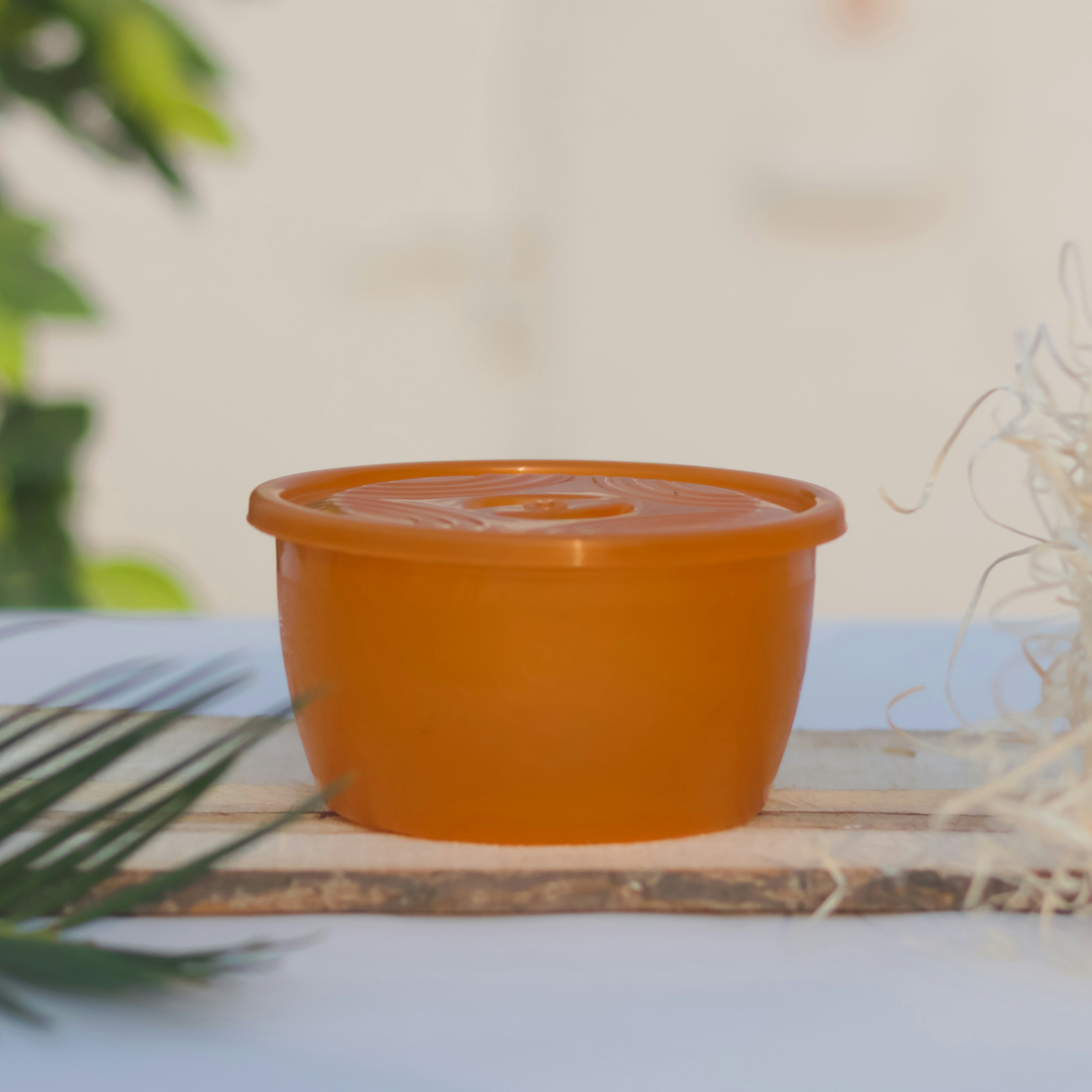 a pot with a plant in it