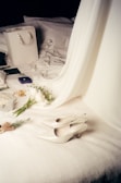 a pair of shoes on a bed