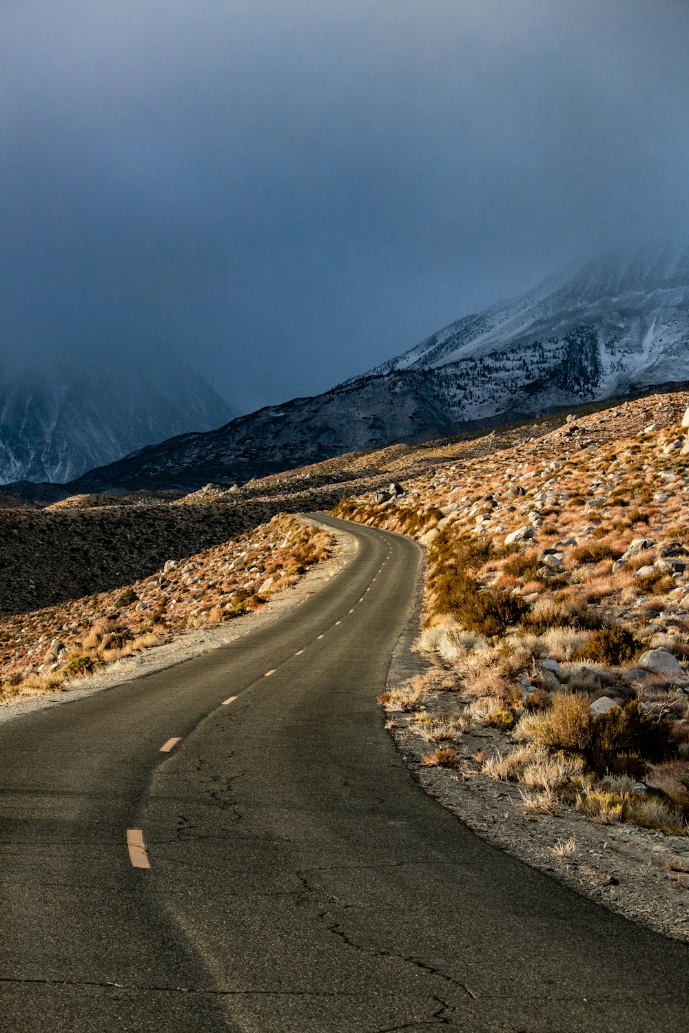 a road with snow on the side