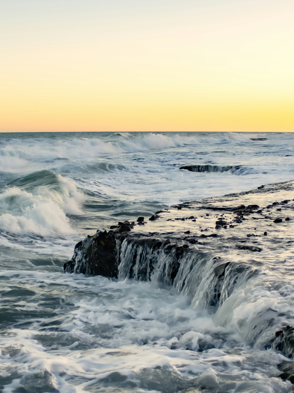 waves crashing on a rocky beach