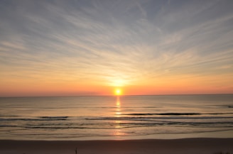 a sunset over the ocean