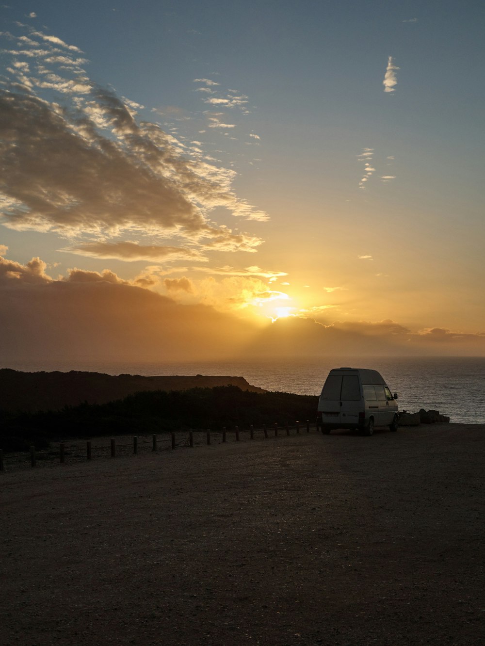 a van parked on a beach