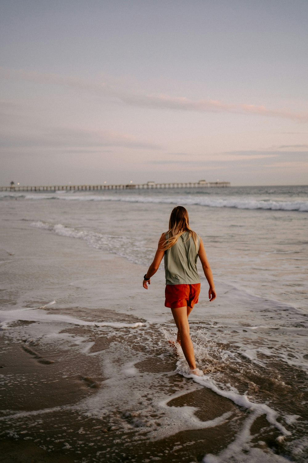 a person walking on a beach