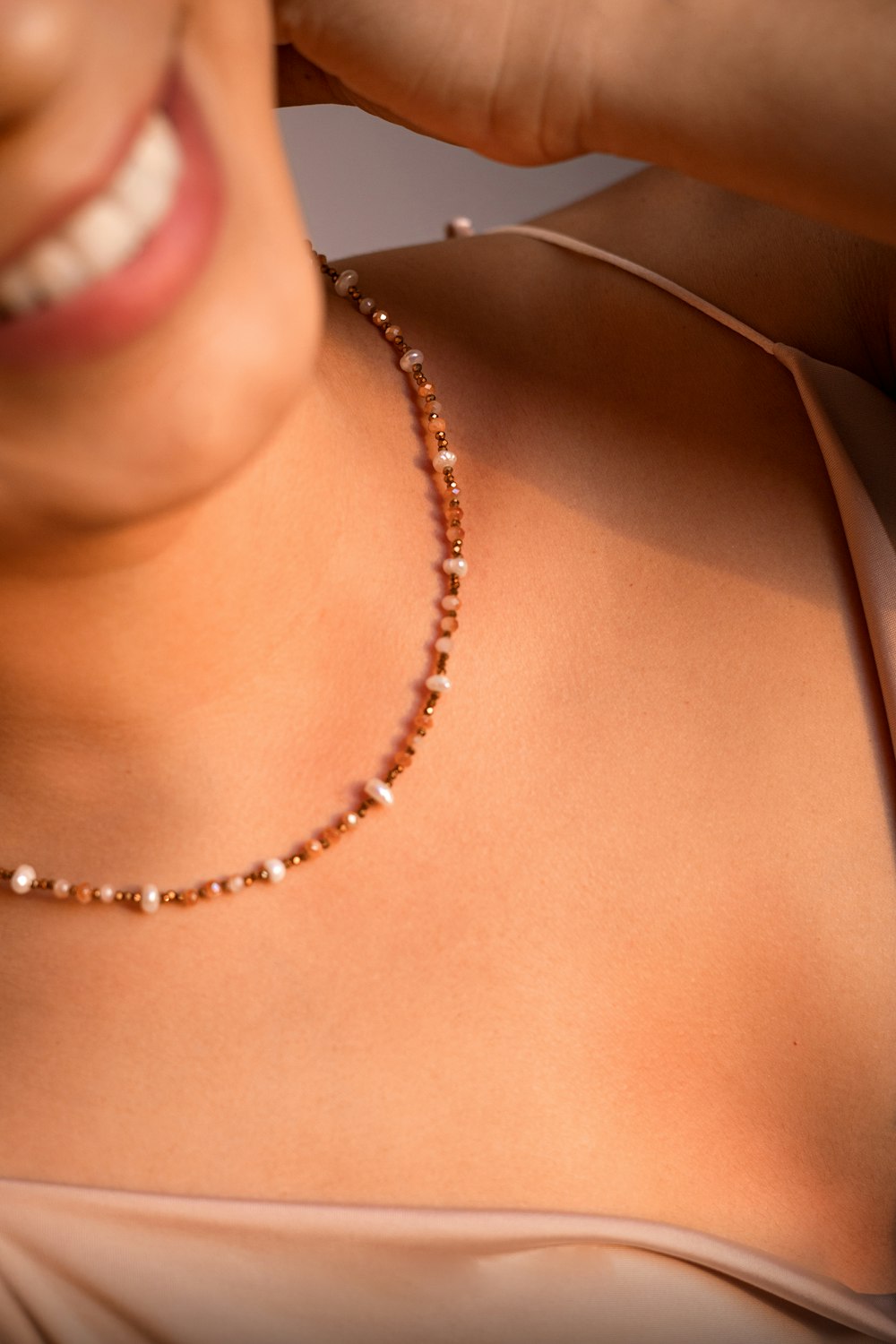 a close-up of a woman's necklace