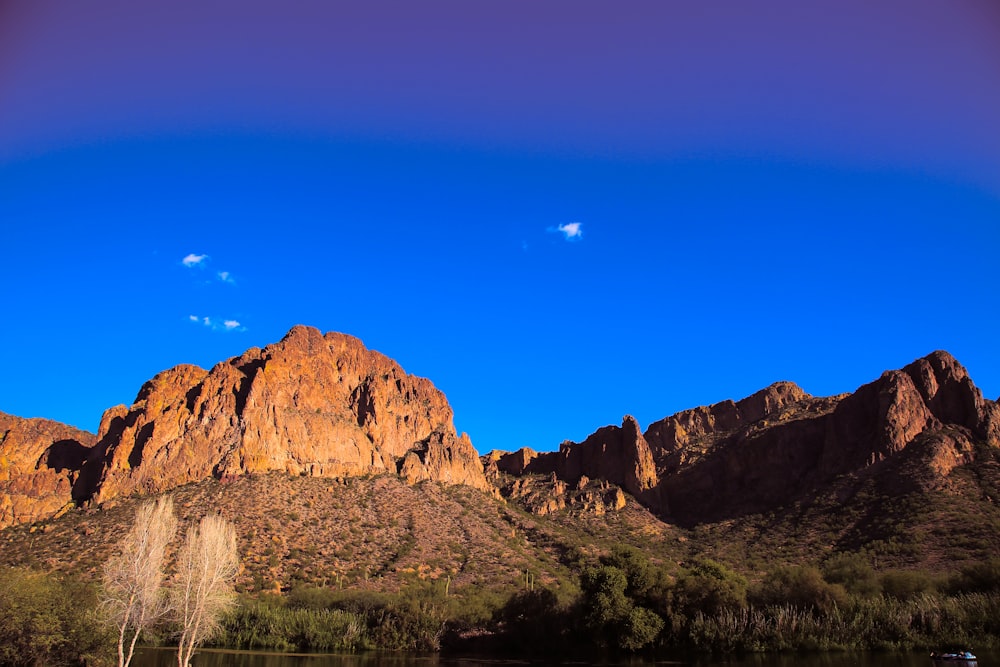 a landscape with mountains and trees