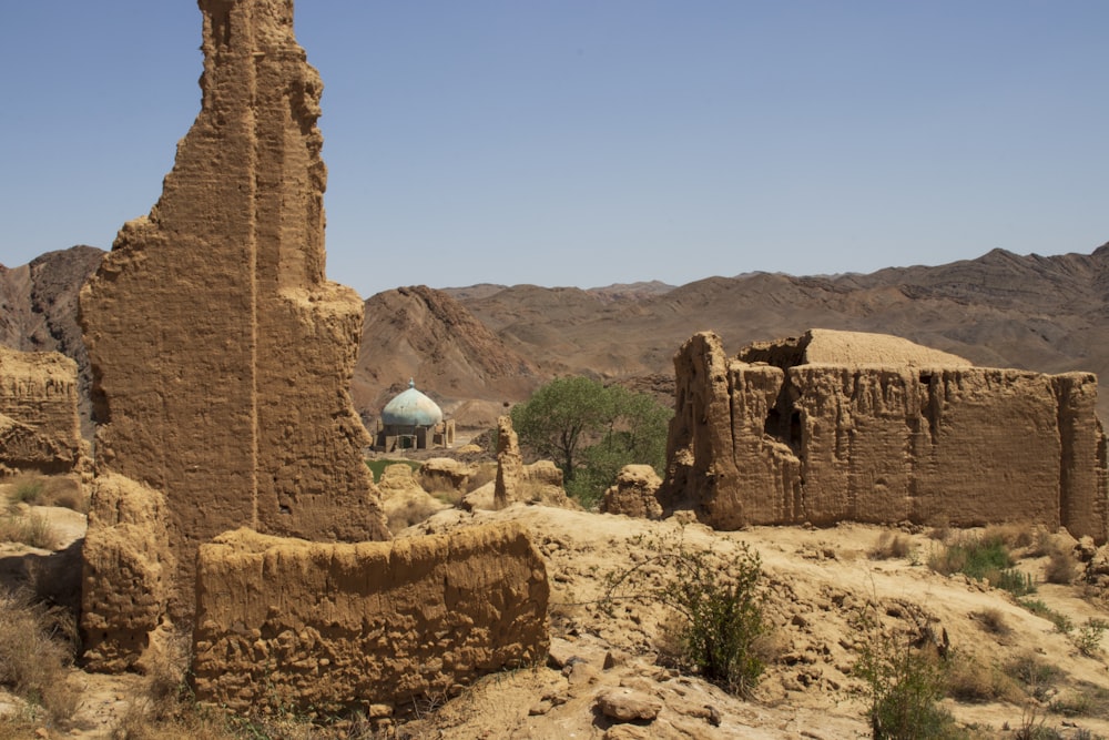 a stone structure in the desert