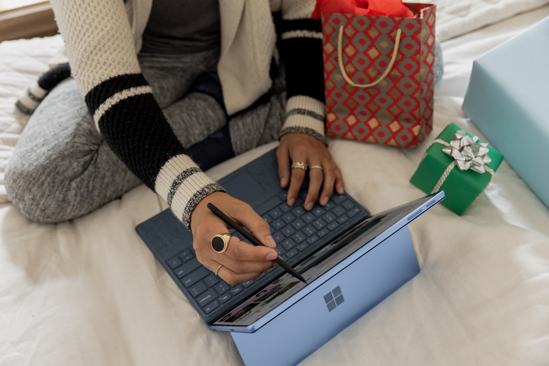 a person using a laptop,