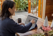 a woman using a laptop