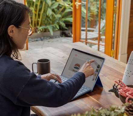 a woman using a laptop