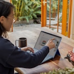 a woman using a laptop