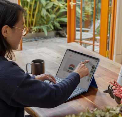 a woman using a laptop