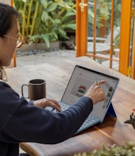 a woman using a laptop