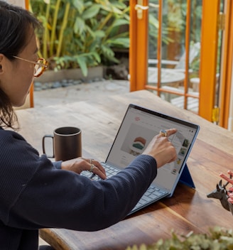 a woman using a laptop