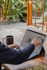 a woman using a laptop