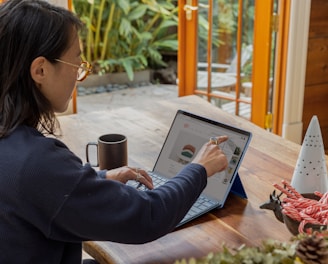 a woman using a laptop