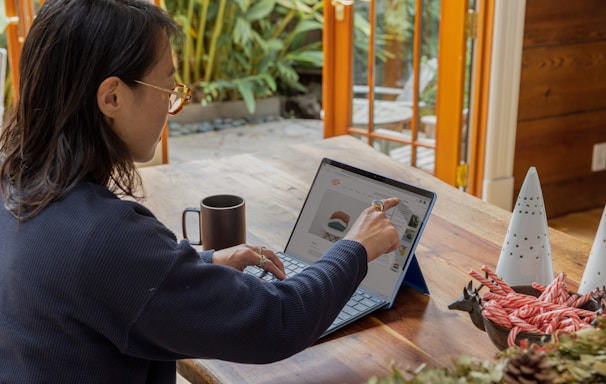 a woman using a laptop