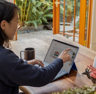 a woman using a laptop