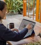 a woman using a laptop