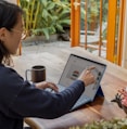 a woman using a laptop