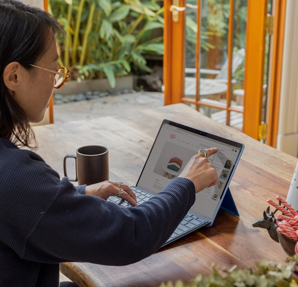 a woman using a laptop