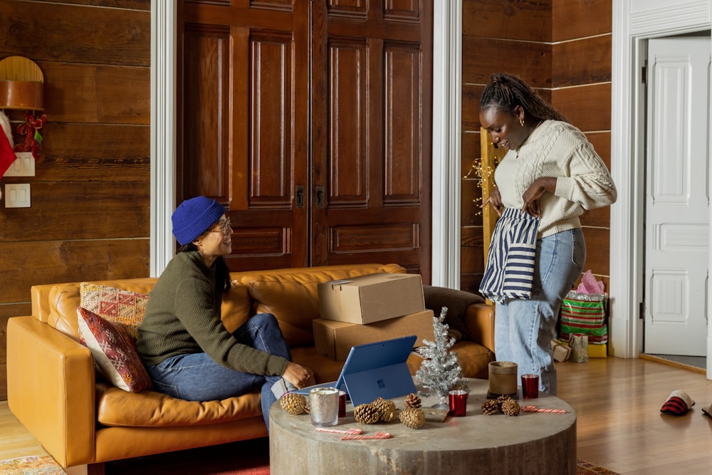 a group of people sitting around a living room