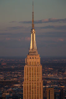 Exterior shot of a towering New York architectural landmark at dusk, symbolizing institutional strength.
