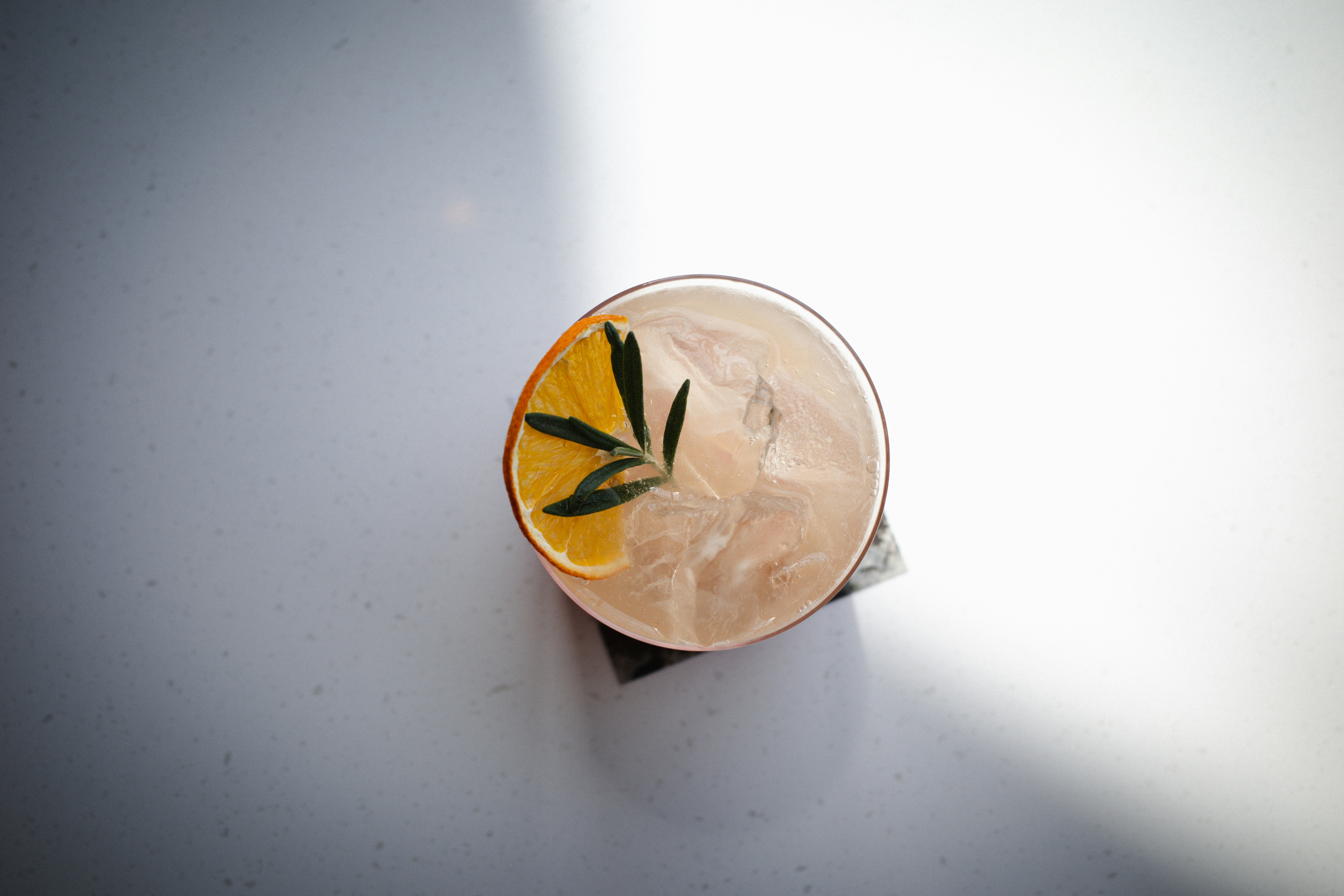 a glass with a yellow and black design on it