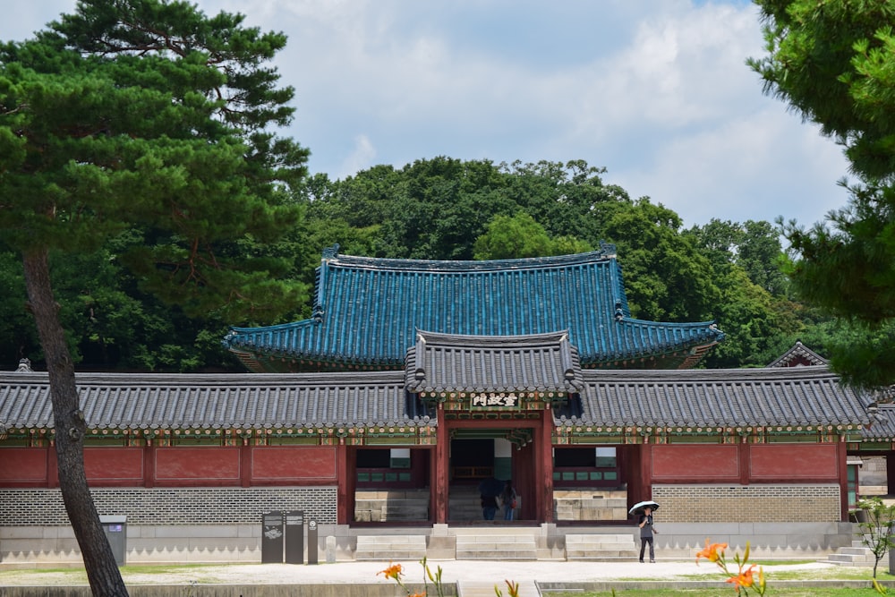 a building with a blue roof