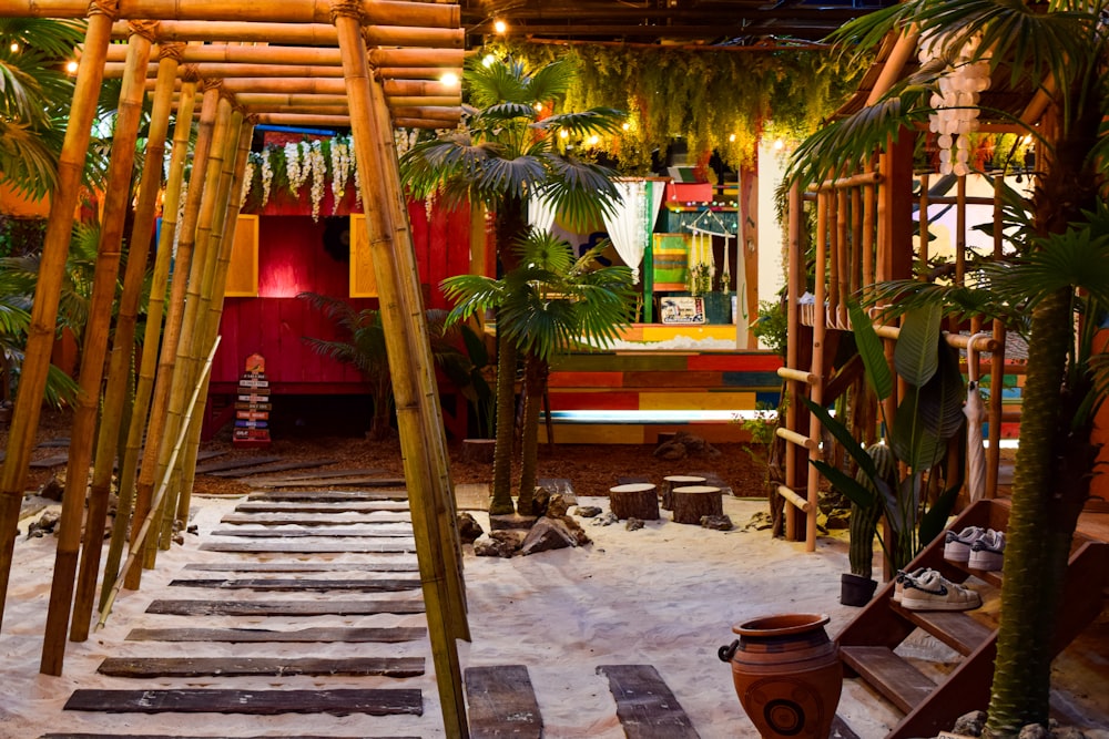 a building with palm trees and stairs