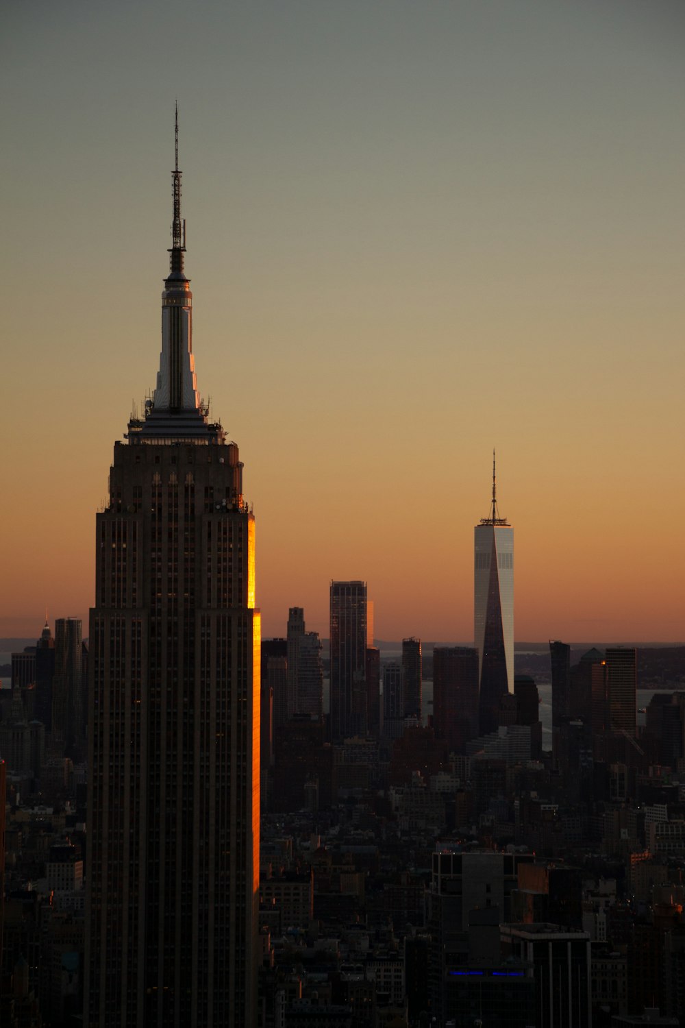 a city skyline with tall buildings