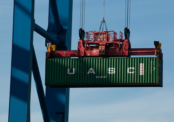 a large green and red ship