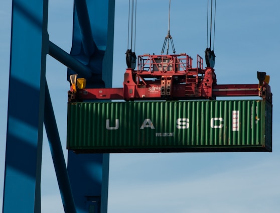 a large green and red ship