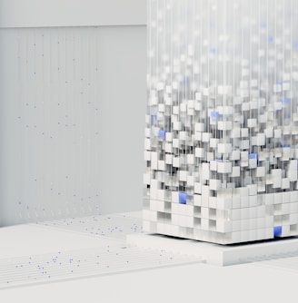 a white cube with blue squares