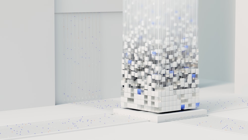 a white cube with blue squares