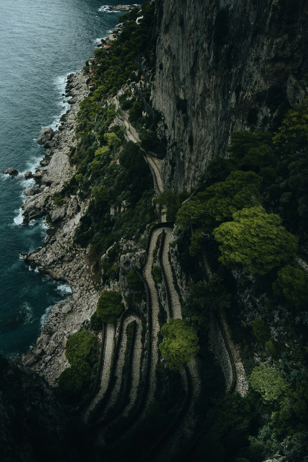 a cliff with a waterfall