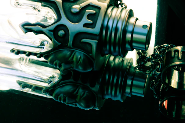 Detail of spray cannon nozzle with water droplets sparkling in sunlight.