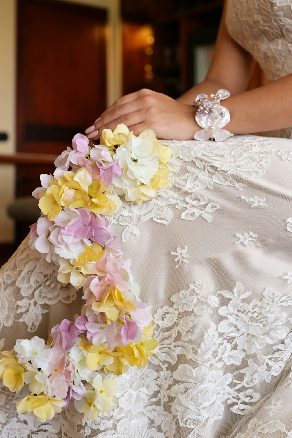 a person holding a bouquet of flowers