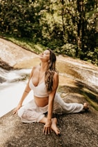 A serene scene of a woman practicing yoga in a chic, comfortable outfit, embodying balance and style.