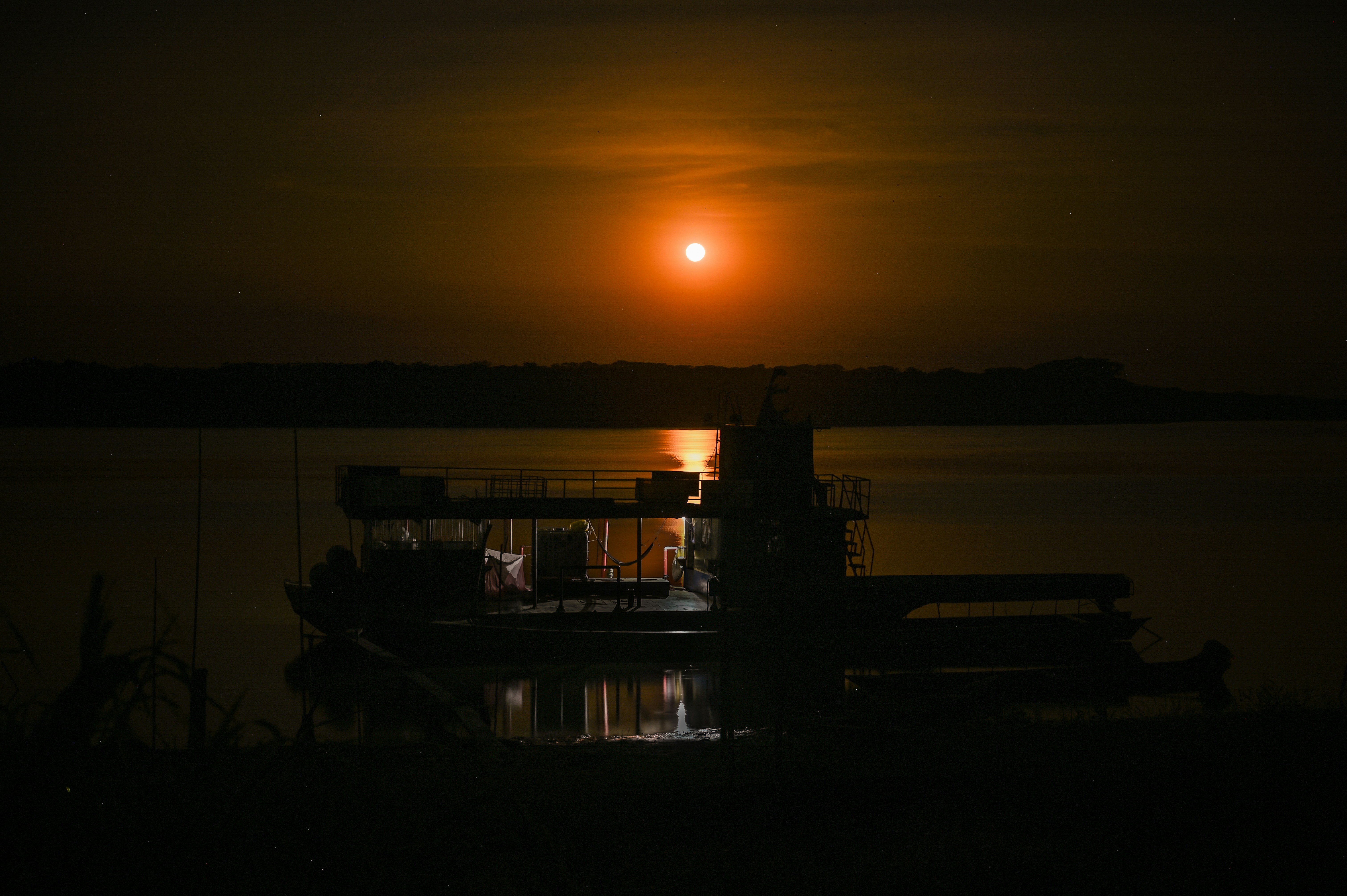 a sunset over a lake