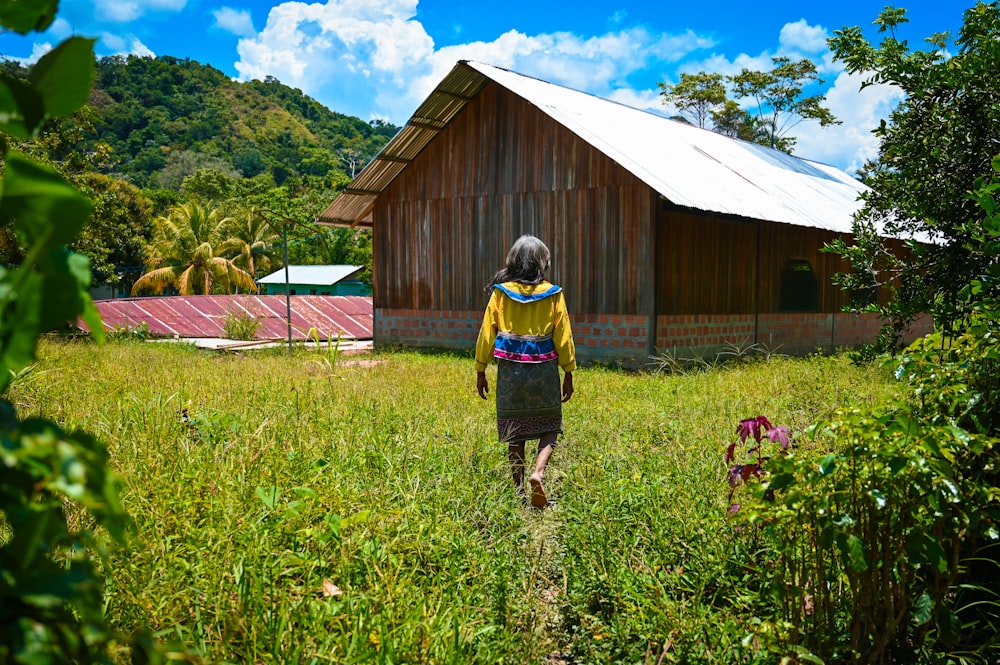 a child walking in a field